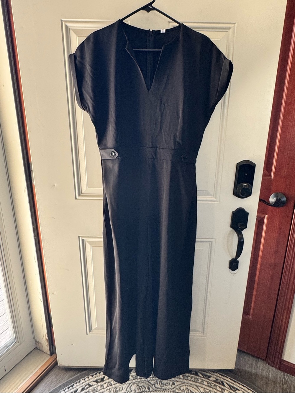 Women's Black V-Neck Jumpsuit with Buttoned Waist Detail
